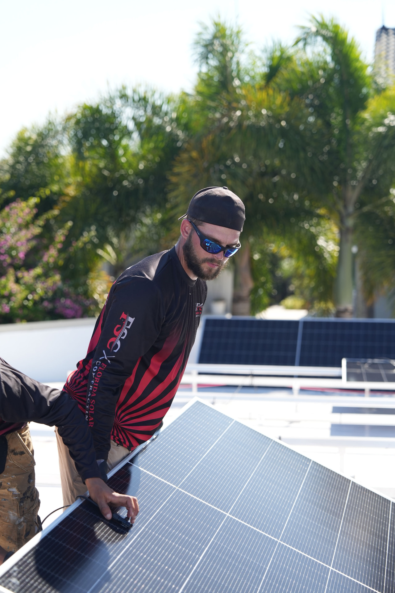 FSC technician working with a solar panel